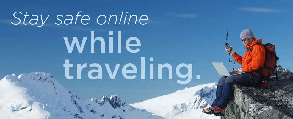 Stay safe online while traveling. Person atop snowy mountain holding wifi signal device.